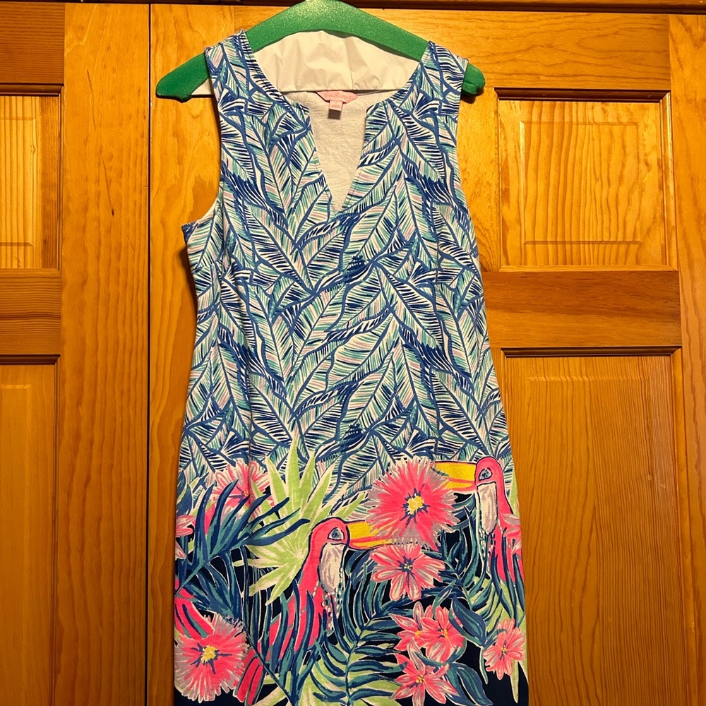 Lilly  Pulitzer dress. Bright floral with bird pattern. In good condition